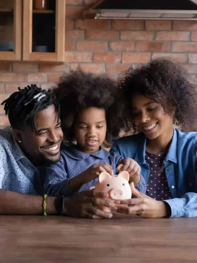 Smiling,Young,African,American,Family,With,Daughter,Save,Money,In