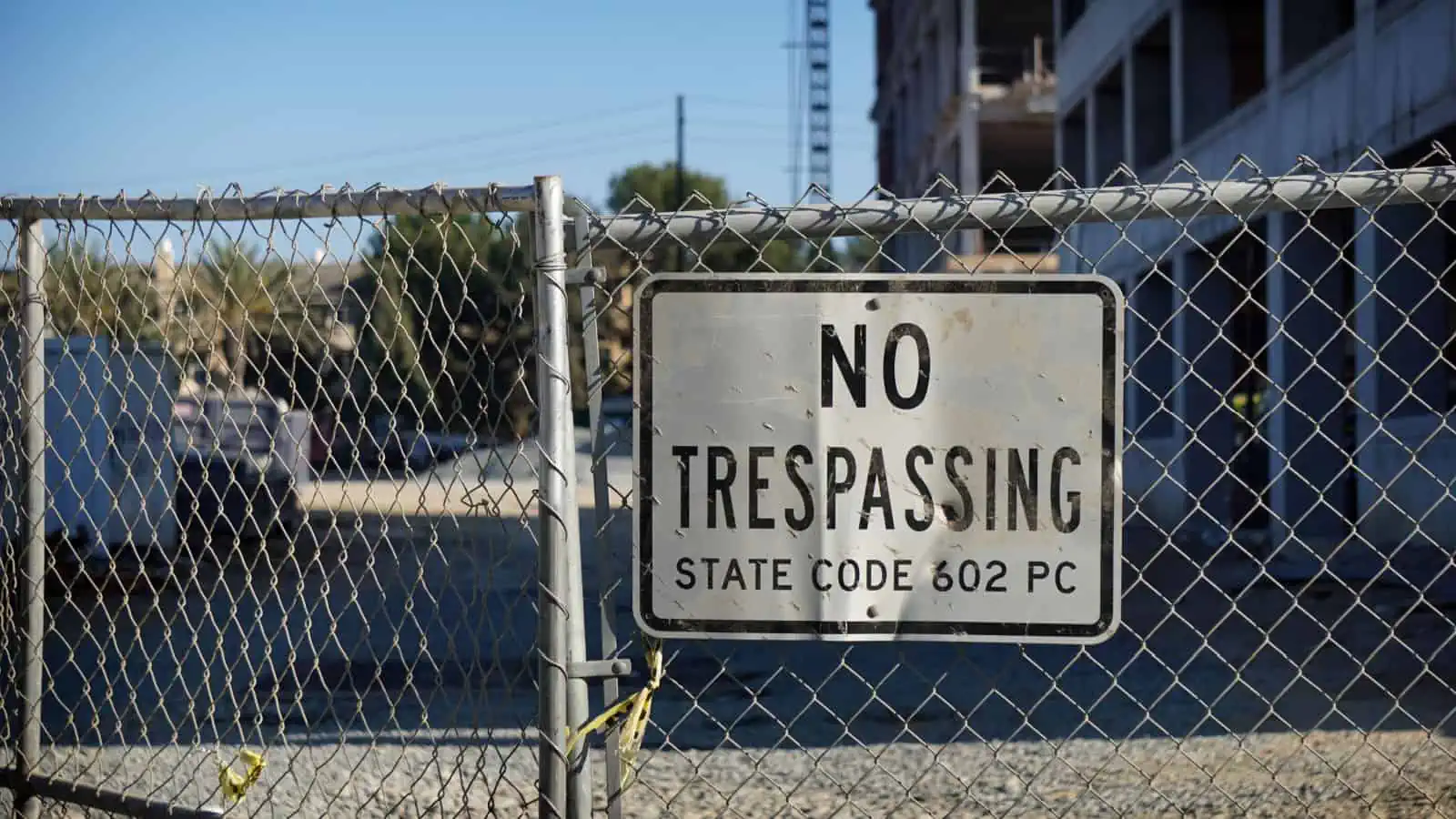 No trespassing sign on fence
