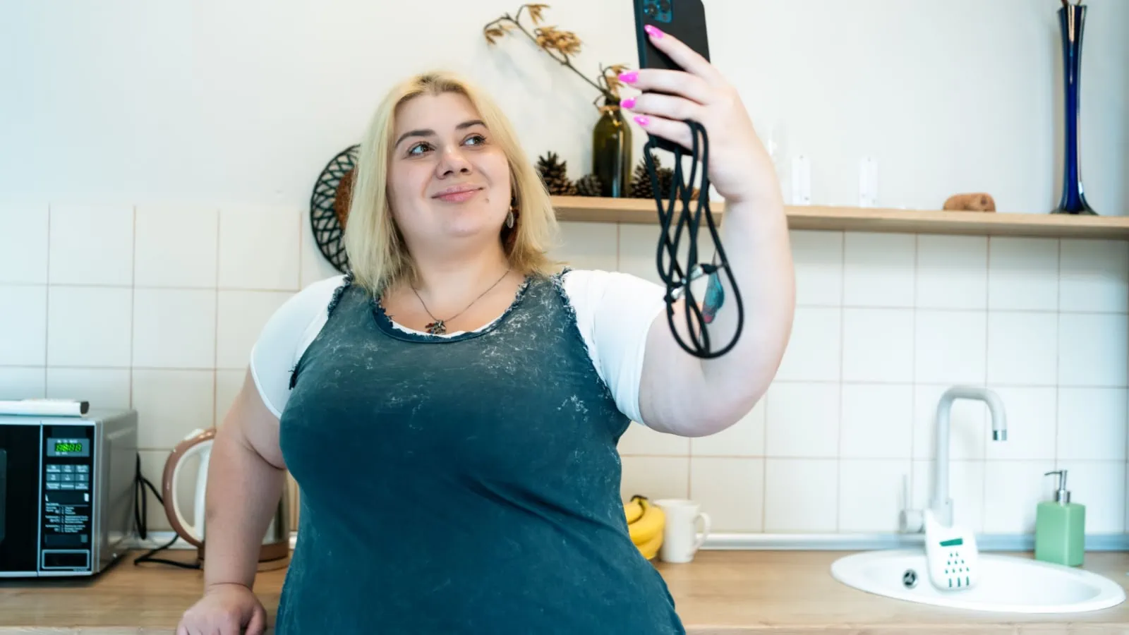 Fat woman taking a selfie