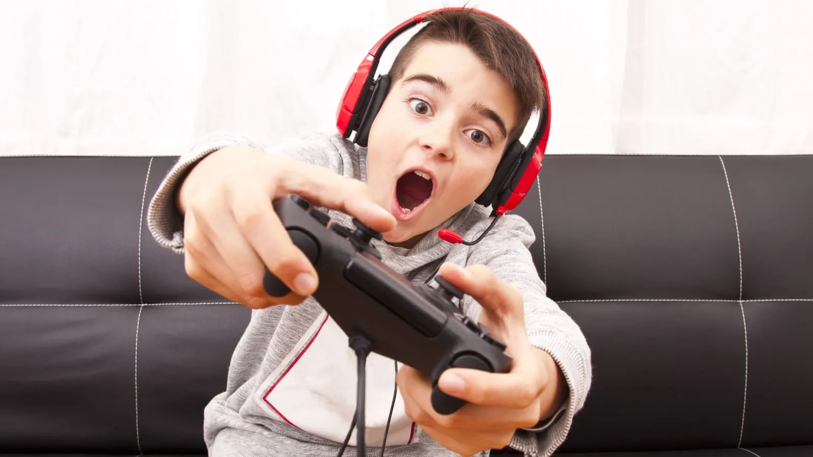 Kid playing computer games