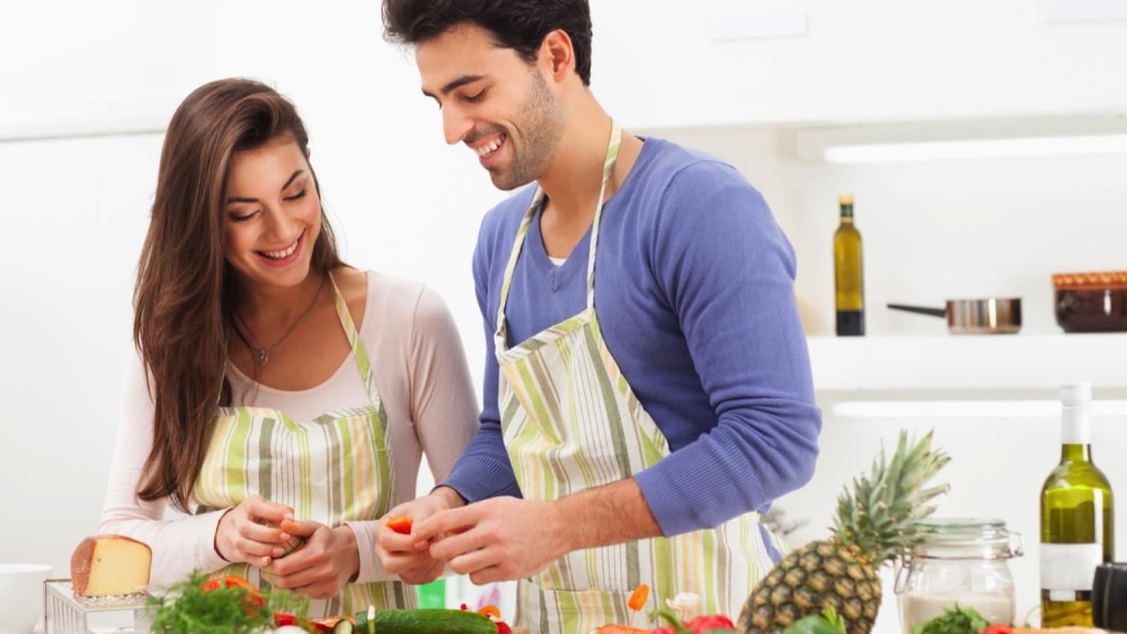 Romantic young couple preparing italian food