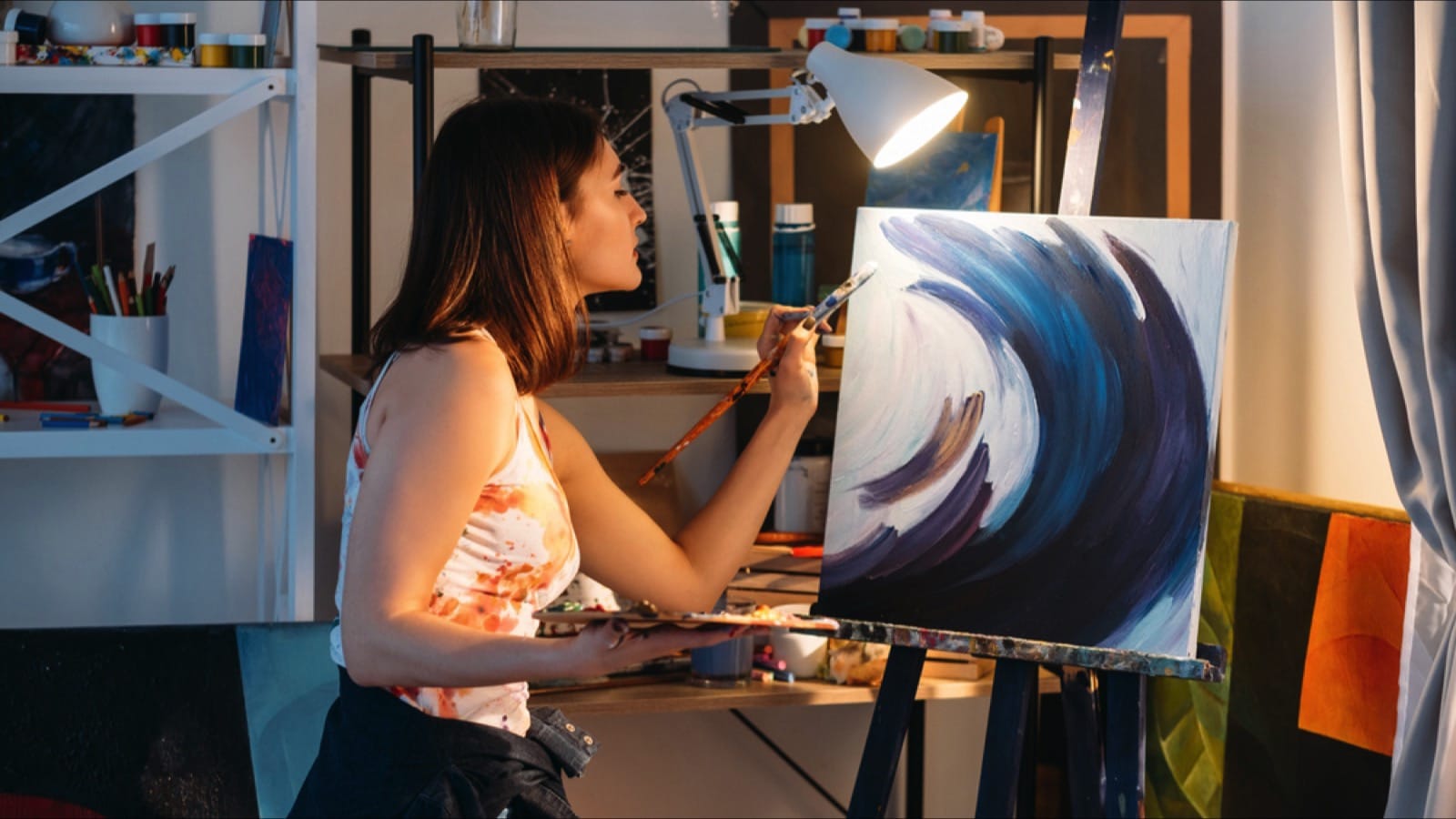 Woman doing oil painting