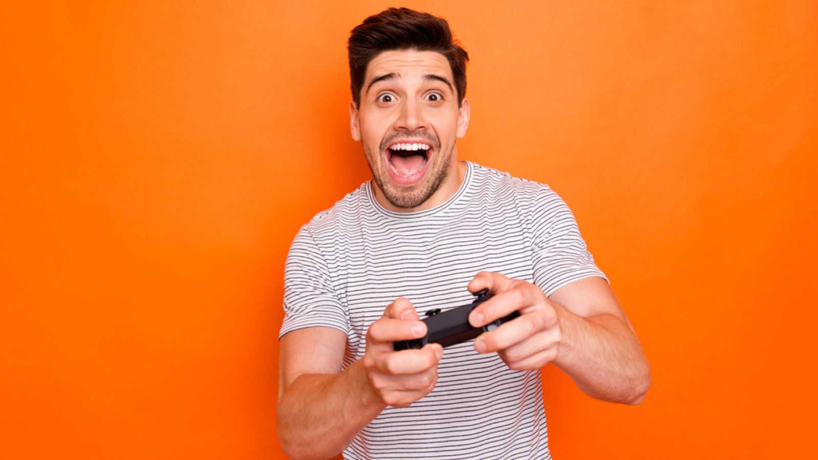 Excited man playing video game